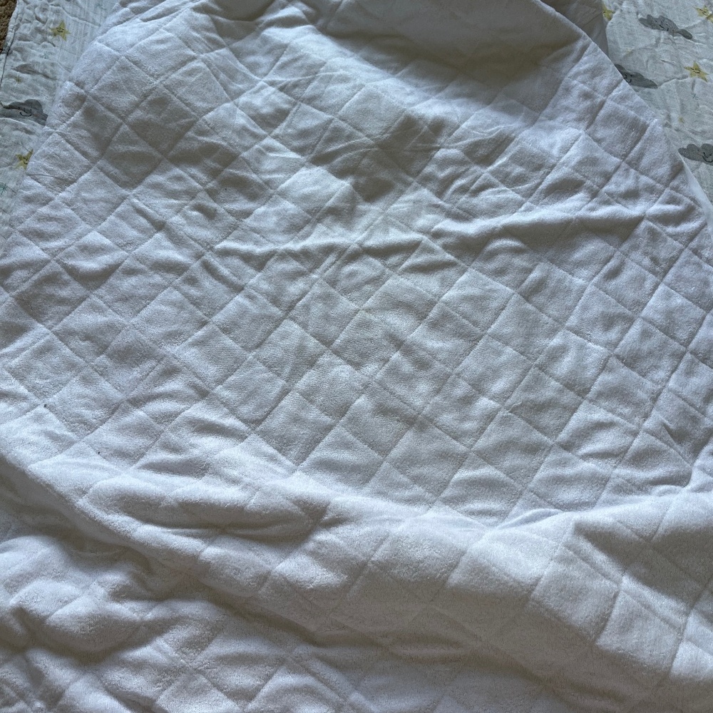 Crib mattress protector and fitted sheets